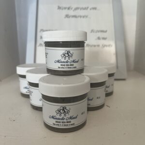 Stacked skincare cream jars with a clean, minimalist design.