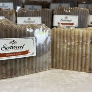 Handmade seaweed soap bars with natural ingredients on display.