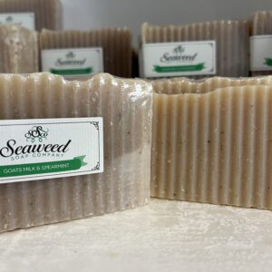 Two bars of natural soap labeled 'Seaweed' on a white surface.